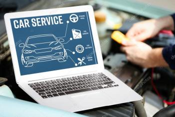 depositphotos 127104178 stock photo laptop near car engine modern